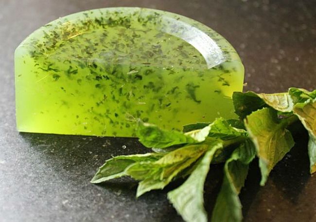 Lovely green transparent soap with herb inclusions